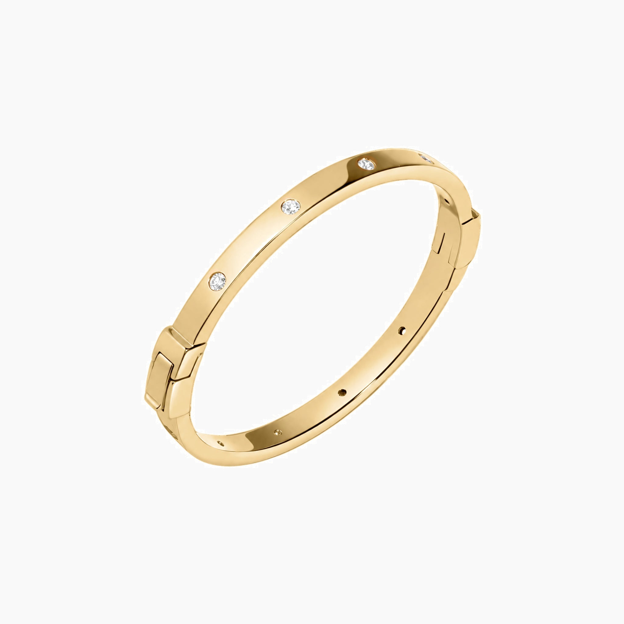 Moissanite station bangle bracelet in yellow gold vermeil, angled view.