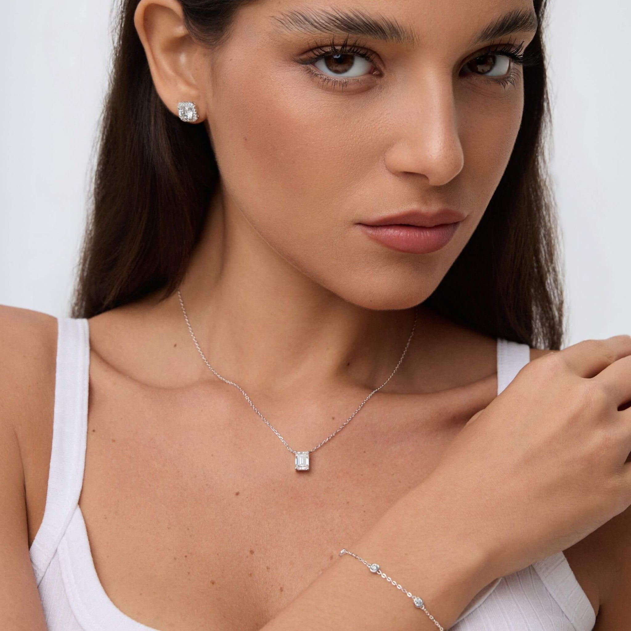 Moissanite station bracelet worn on the wrist.