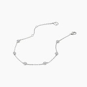 Moissanite station bracelet in white gold vermeil, open view showing the closure.