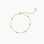 Moissanite station bracelet in yellow gold vermeil, full product view.