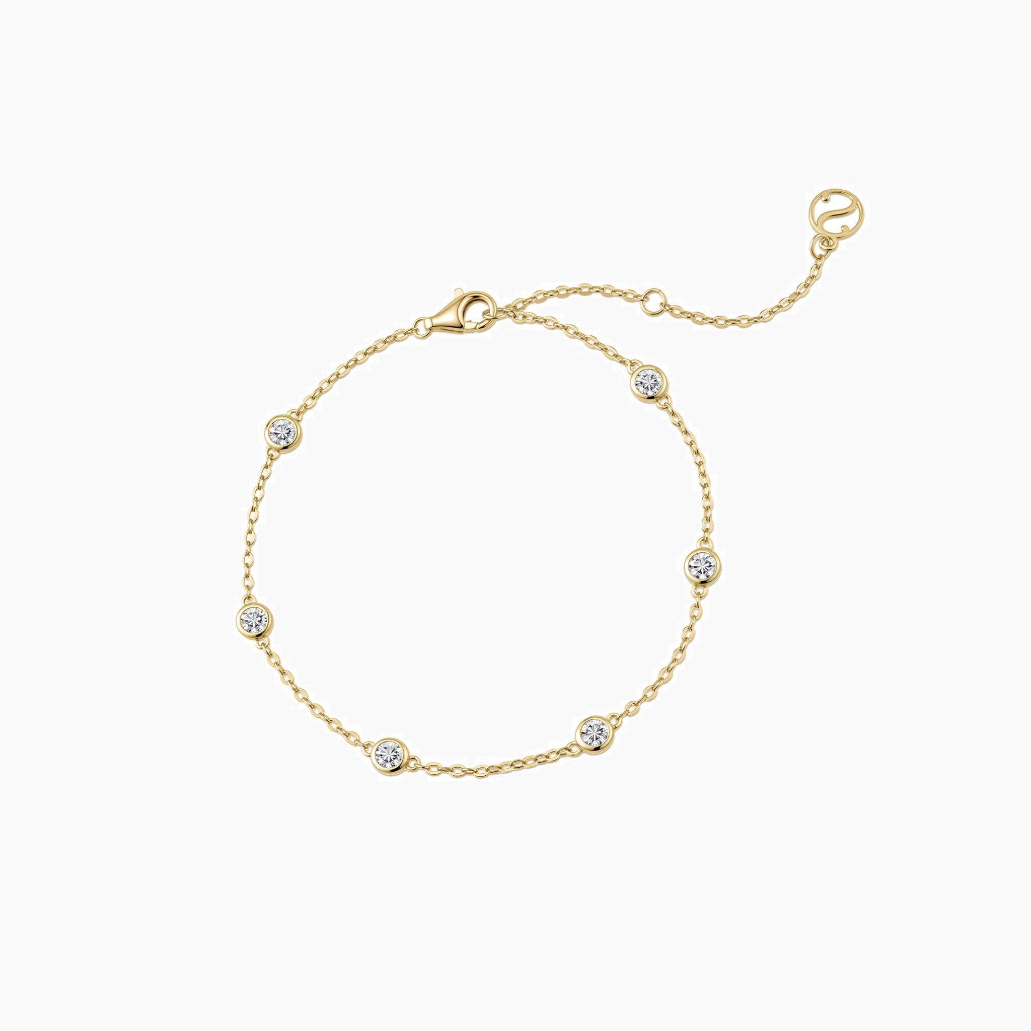 Moissanite station bracelet in yellow gold vermeil, full product view.