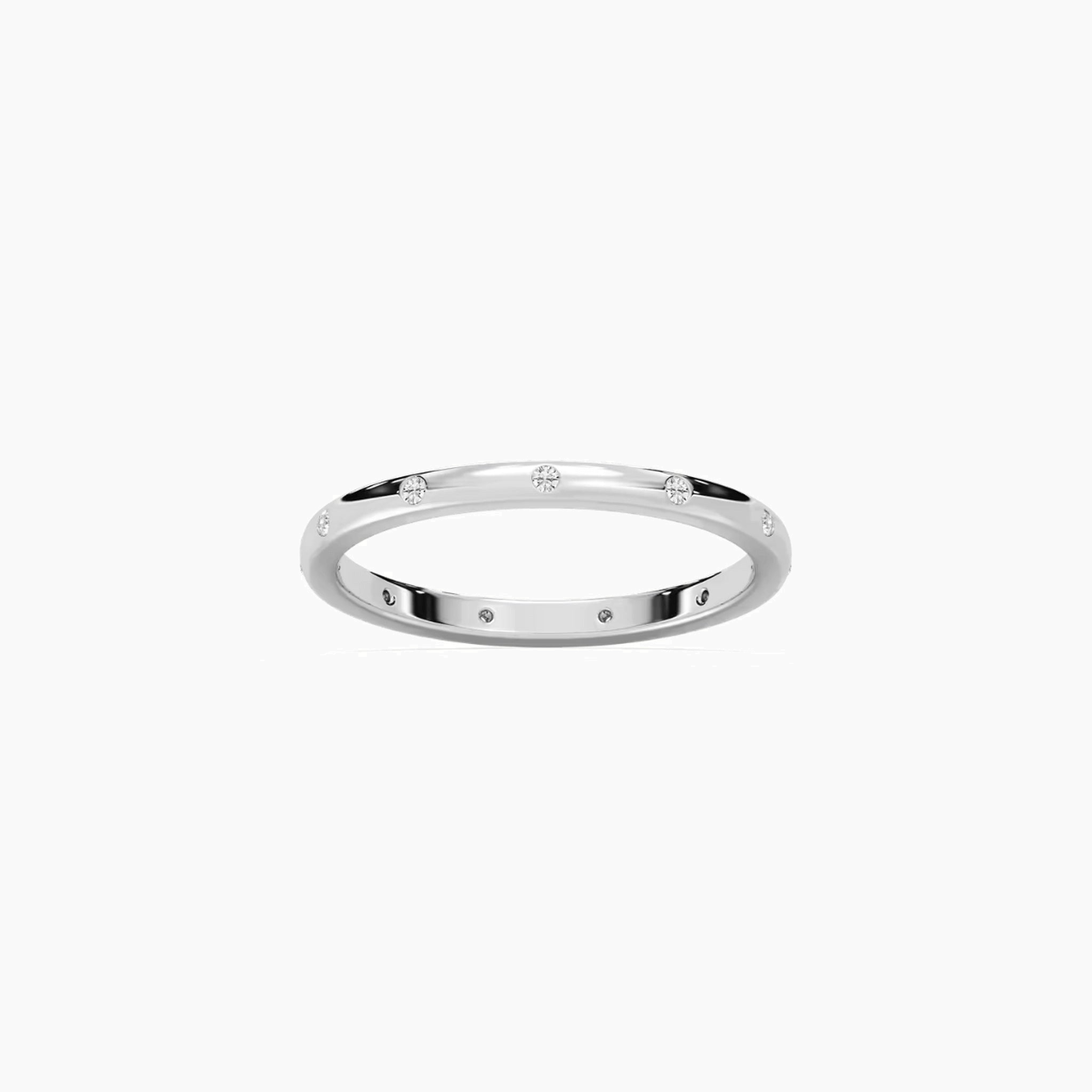 Moissanite station ring in white gold vermeil, front view.