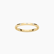 Moissanite station ring in yellow gold vermeil, front view.