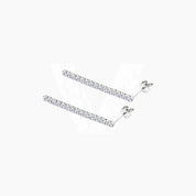Moissanite tennis drop earrings in white gold vermeil, full product view.