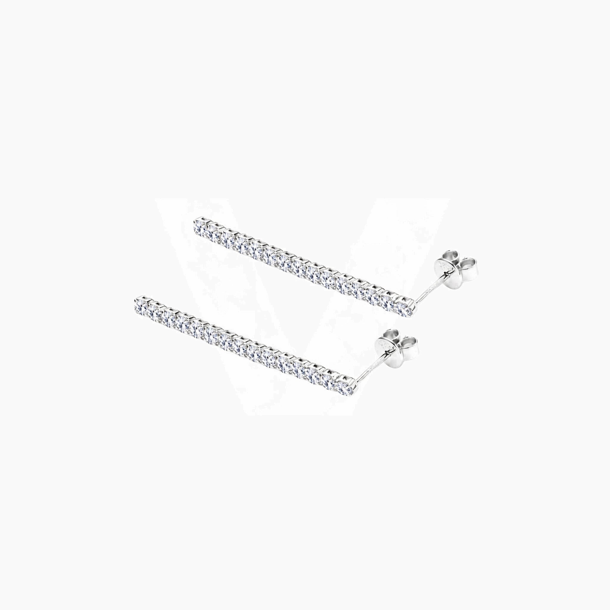 Moissanite tennis drop earrings in white gold vermeil, full product view.