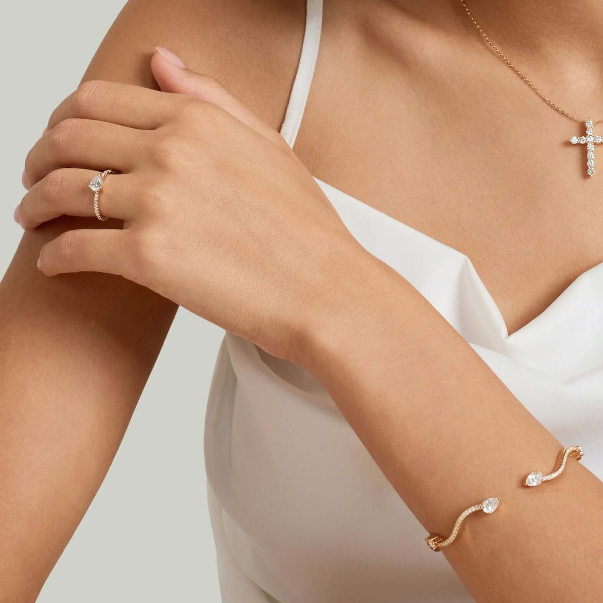 Moissanite wavy cuff bracelet worn on the wrist.