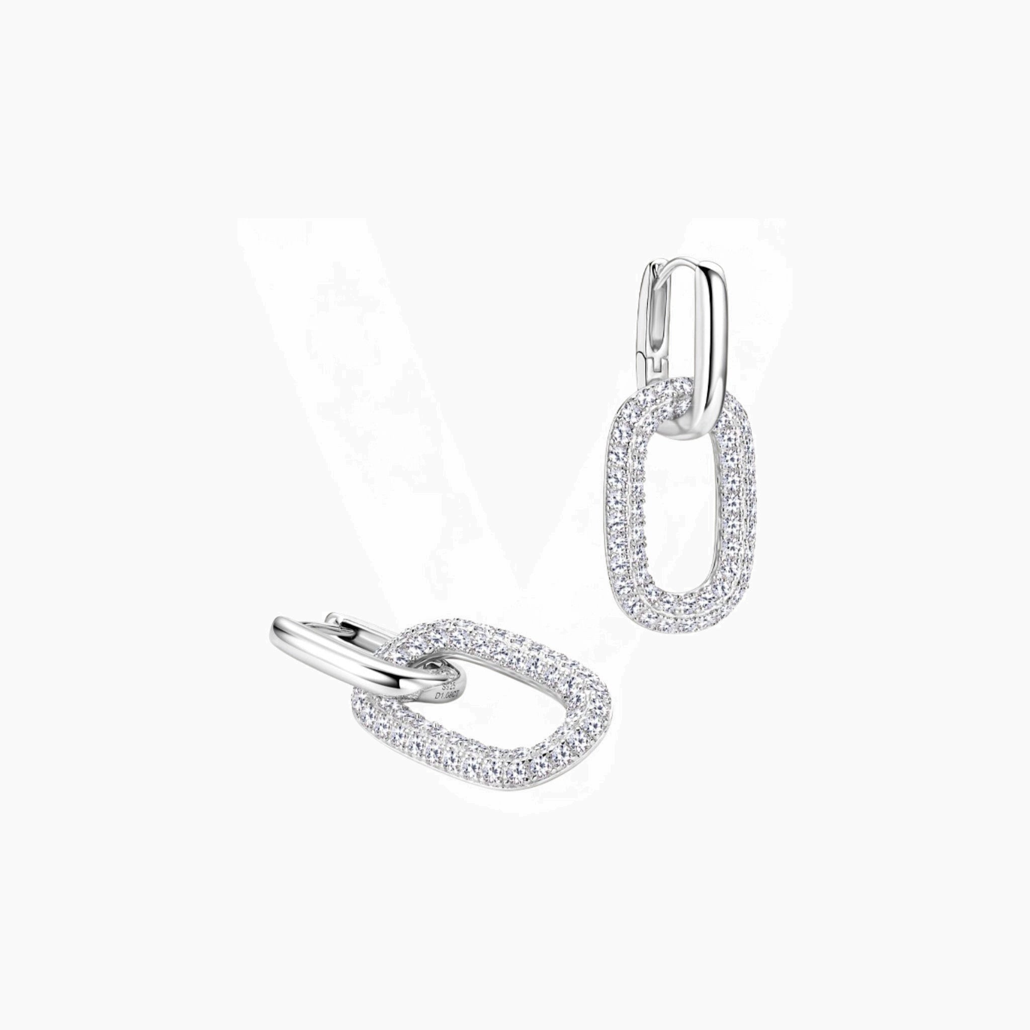 Multiway bold pavé moissanite link earrings in white gold vermeil, angled view.