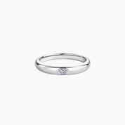Oval-cut moissanite bezel dome ring in white gold vermeil, front view.