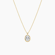 Oval-cut moissanite bezel pendant necklace in yellow gold vermeil, full product view.