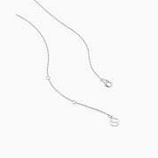 Oval-cut moissanite pendant necklace in white gold vermeil, clasp and chain-end detail.