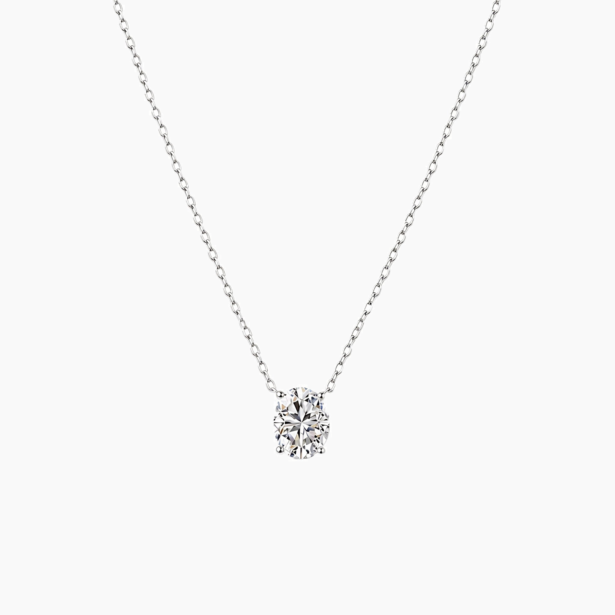 Oval-cut moissanite pendant necklace in white gold vermeil, front view.