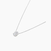 Oval-cut moissanite pendant necklace in white gold vermeil, side view.