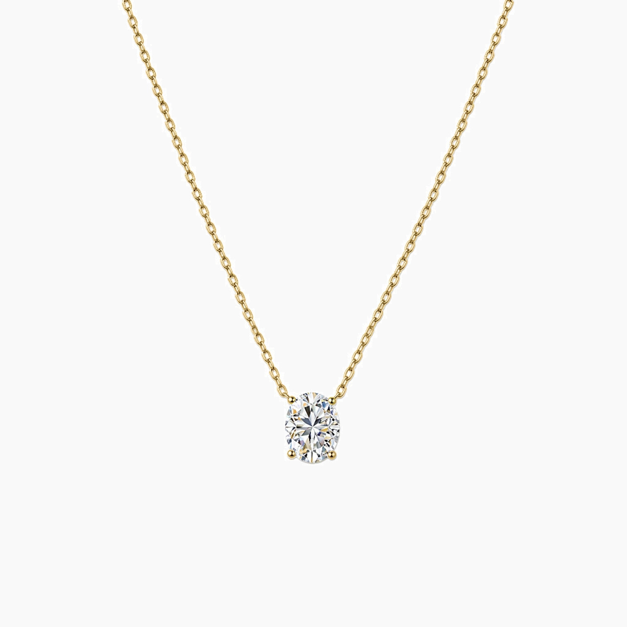 Oval-cut moissanite pendant necklace in yellow gold vermeil, front view.