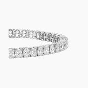 Oval-cut moissanite tennis bracelet in white gold vermeil, close-up detail.