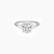Oval-cut moissanite three-stone ring in white gold vermeil, front view.