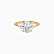 Oval-cut moissanite three-stone ring in yellow gold vermeil, front view.