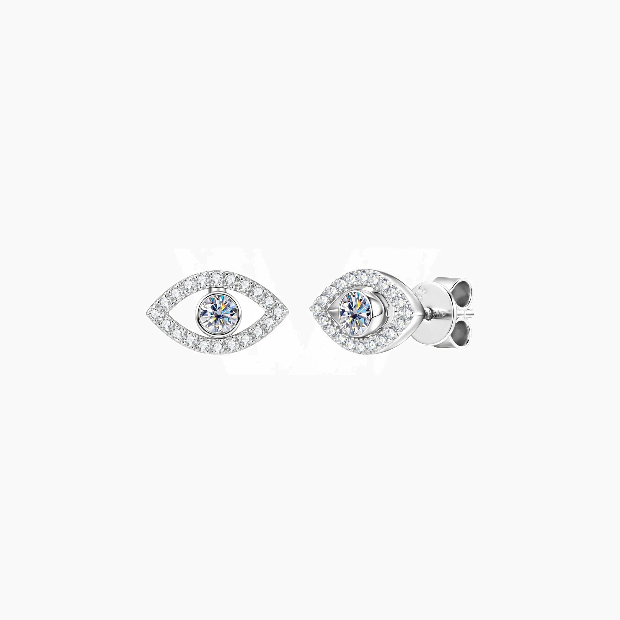 Pavé moissanite evil eye stud earrings in white gold vermeil, front and side views.
