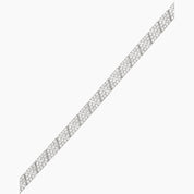 Pavé moissanite triangle-link tennis bracelet in white gold vermeil, close-up detail.