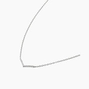 Pavé moissanite wishbone necklace in white gold vermeil, side view.