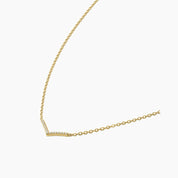 Pavé moissanite wishbone necklace in yellow gold vermeil, side view.