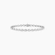 Pear-cut moissanite bezel tennis bracelet in white gold vermeil, closed view.