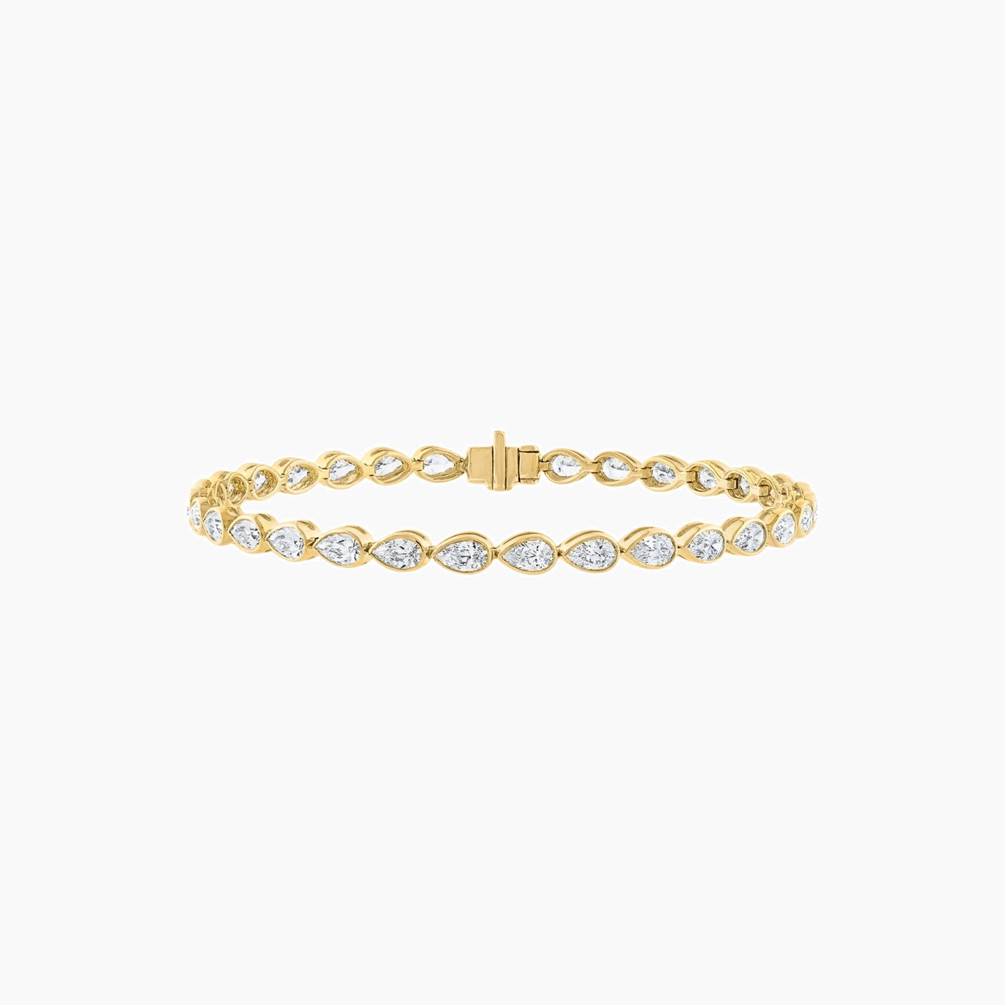 Pear-cut moissanite bezel tennis bracelet in yellow gold vermeil, closed view.