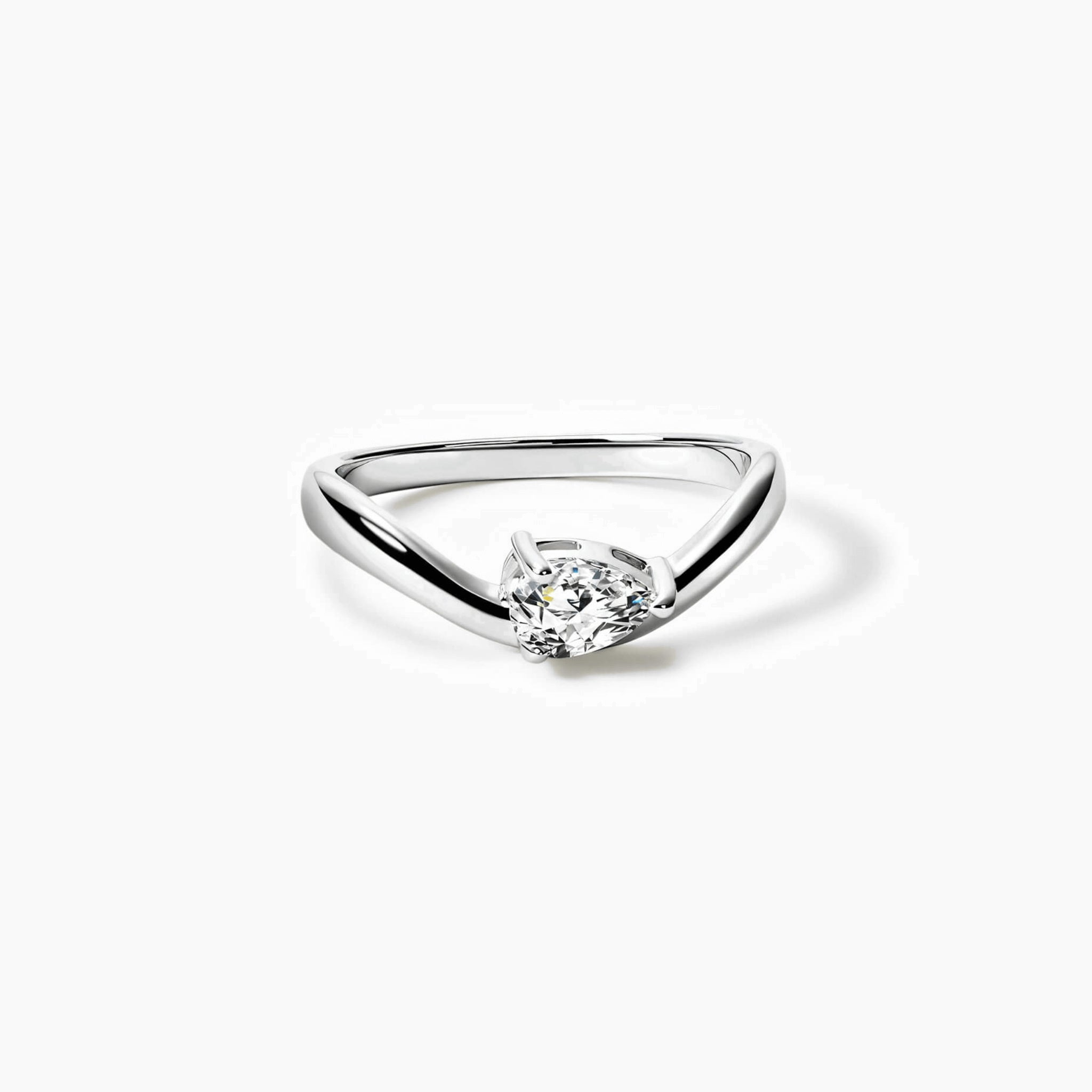 Pear-cut moissanite chevron ring in white gold vermeil, front view.