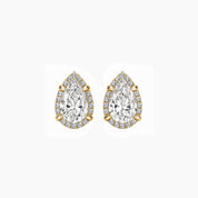 Pear-cut moissanite halo stud earrings in yellow gold vermeil, front view.