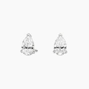 Pear-cut moissanite stud earrings in white gold vermeil, front view.