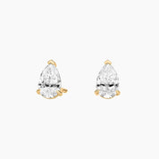 Pear-cut moissanite stud earrings in yellow gold vermeil, front view.