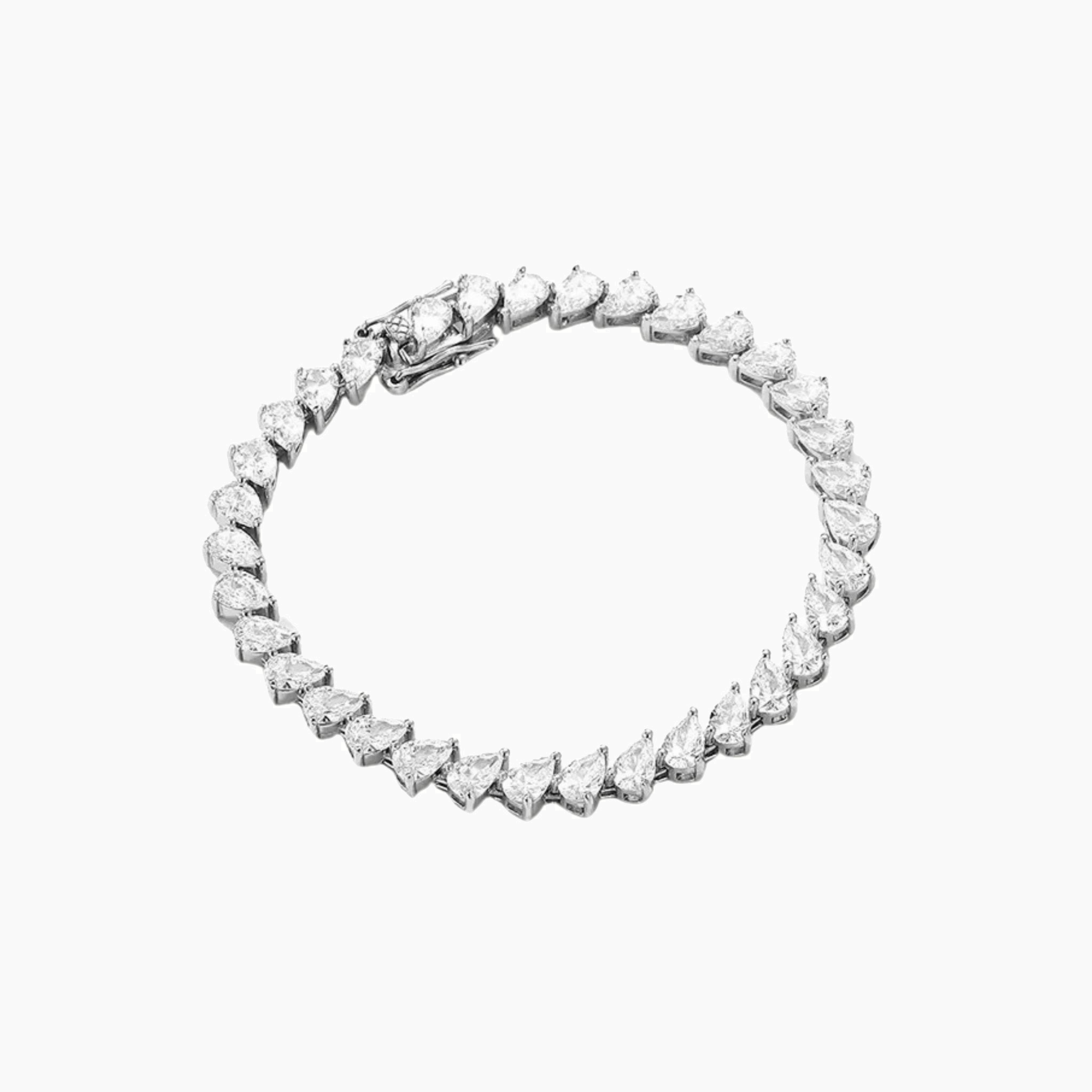 Pear-cut moissanite tennis bracelet in white gold vermeil, full product view.
