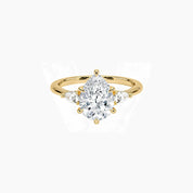 Pear-cut moissanite three-stone ring in yellow gold vermeil, front view.