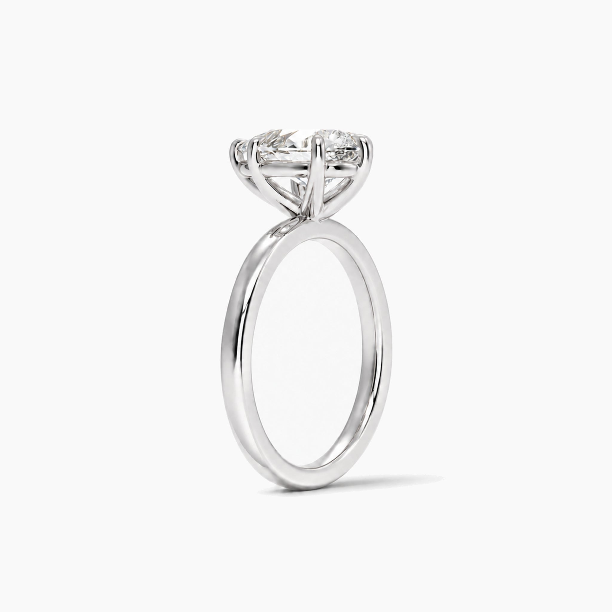 Pear-Cut Moissanite Solitaire Ring in white gold vermeil, side view