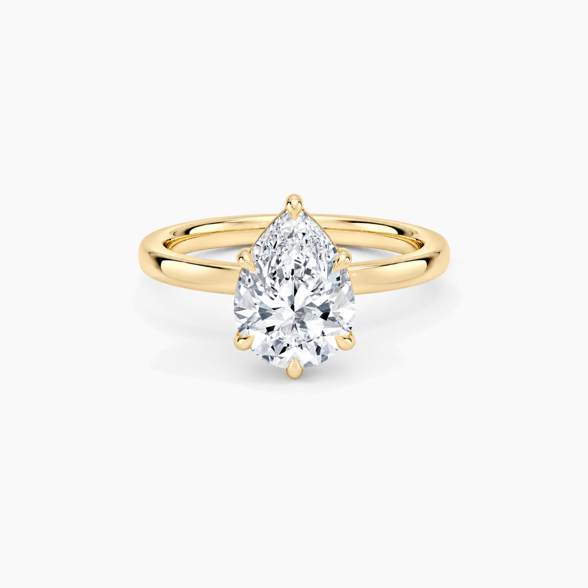 Pear-Cut Moissanite Solitaire Ring in yellow gold vermeil, front view