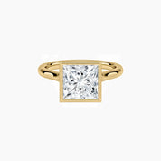 Princess-cut moissanite bezel solitaire ring in yellow gold vermeil, front view.