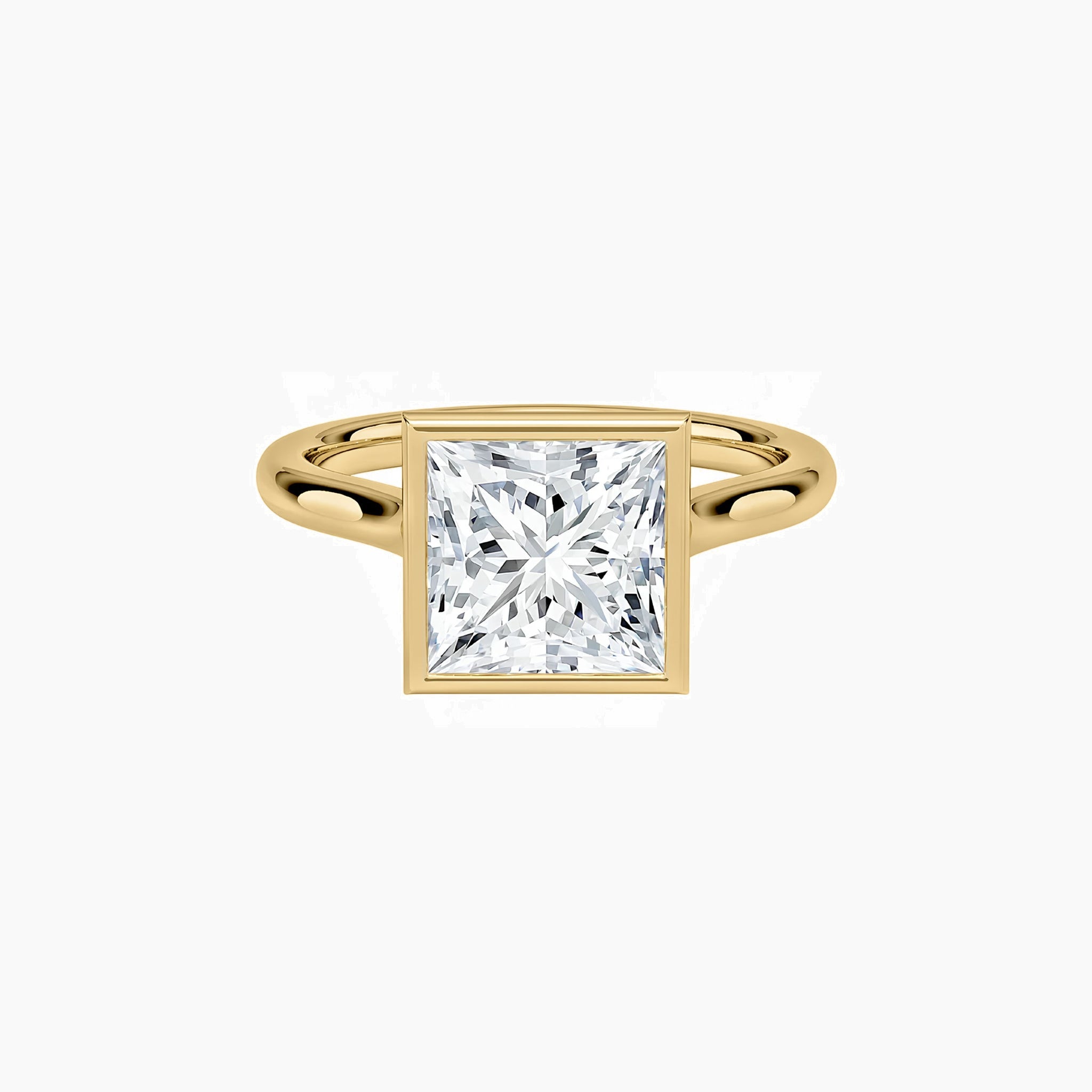Princess-cut moissanite bezel solitaire ring in yellow gold vermeil, front view.
