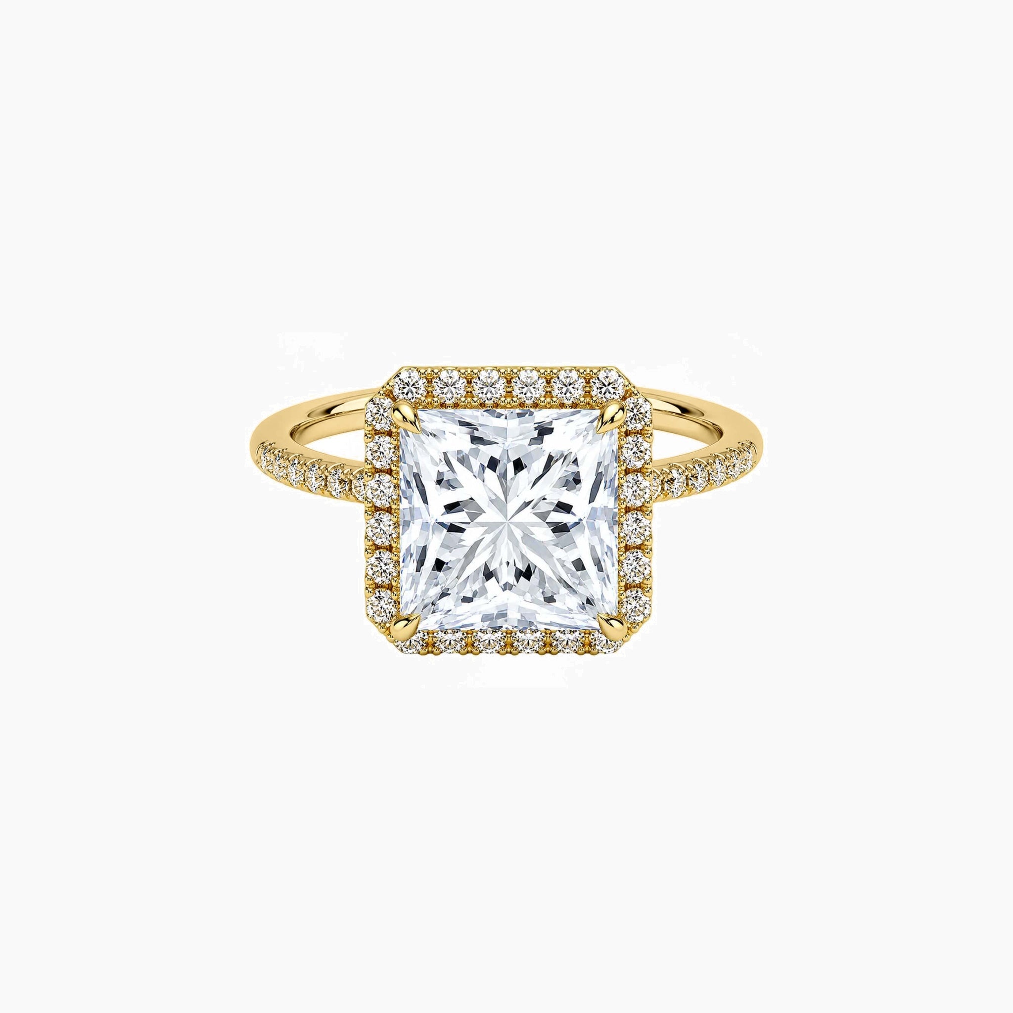 Princess-cut moissanite halo ring with pavé band in yellow gold vermeil, front view.