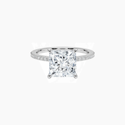 Princess-cut moissanite hidden halo ring with pavé band in white gold vermeil, front view.