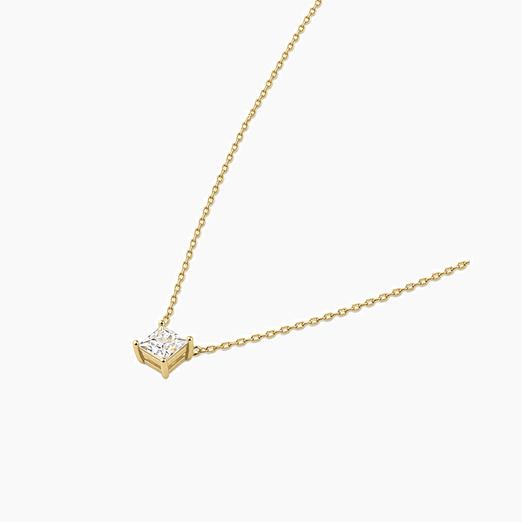 Princess-cut moissanite pendant necklace in yellow gold vermeil, side view.