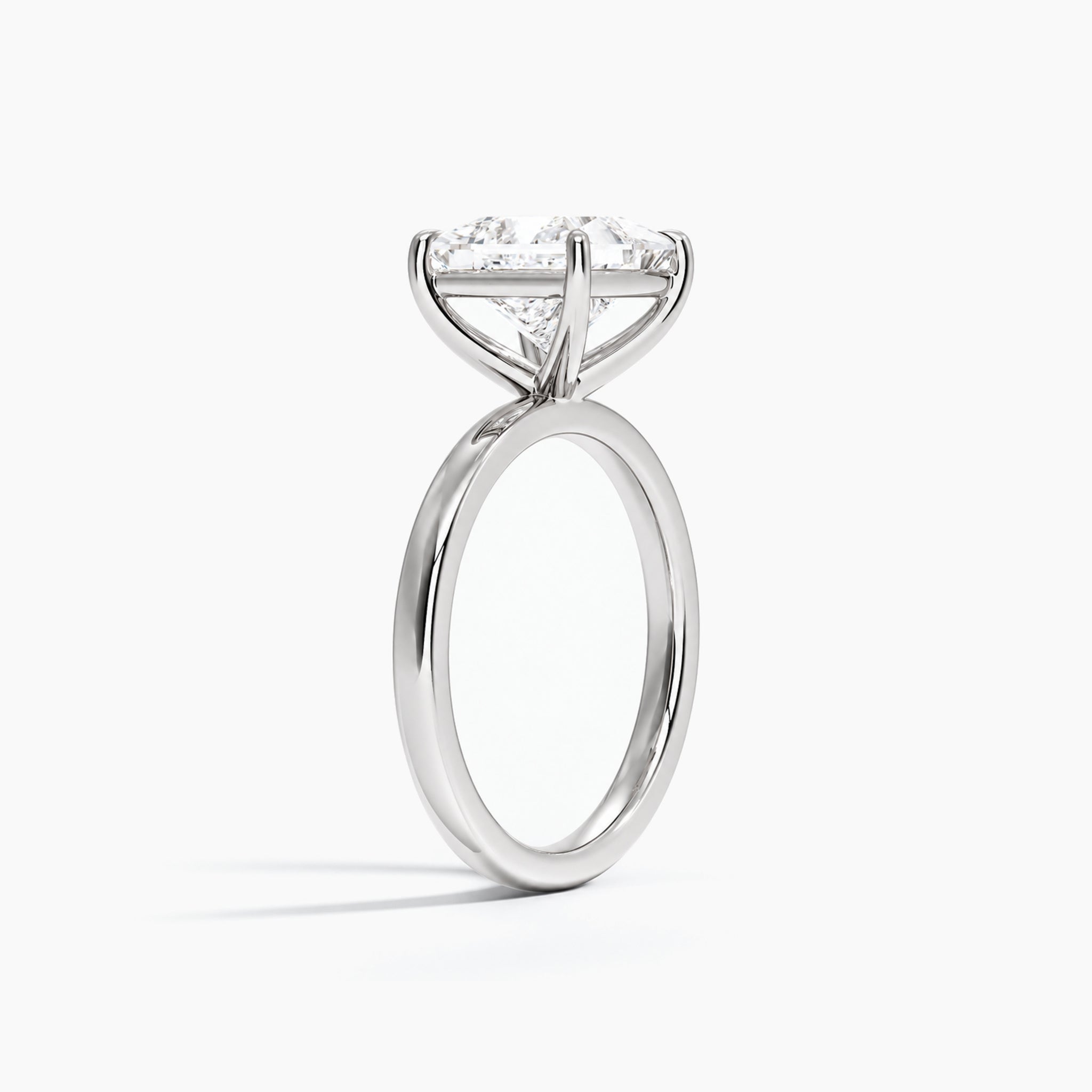 Princess-cut moissanite solitaire ring in white gold vermeil, side view