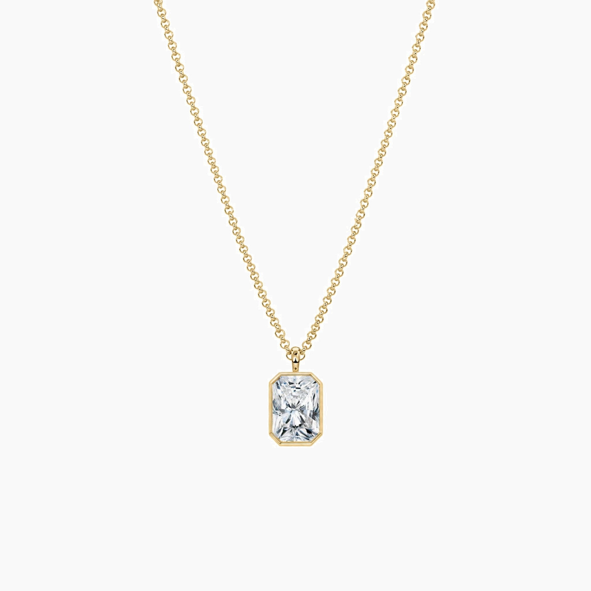 Radiant-cut moissanite bezel pendant necklace in yellow gold vermeil, full product view.