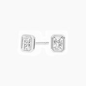 Radiant-cut moissanite bezel stud earrings in white gold vermeil, front and side views.