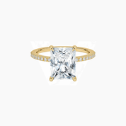 Radiant-cut moissanite hidden halo ring with pavé band in yellow gold vermeil, front view.
