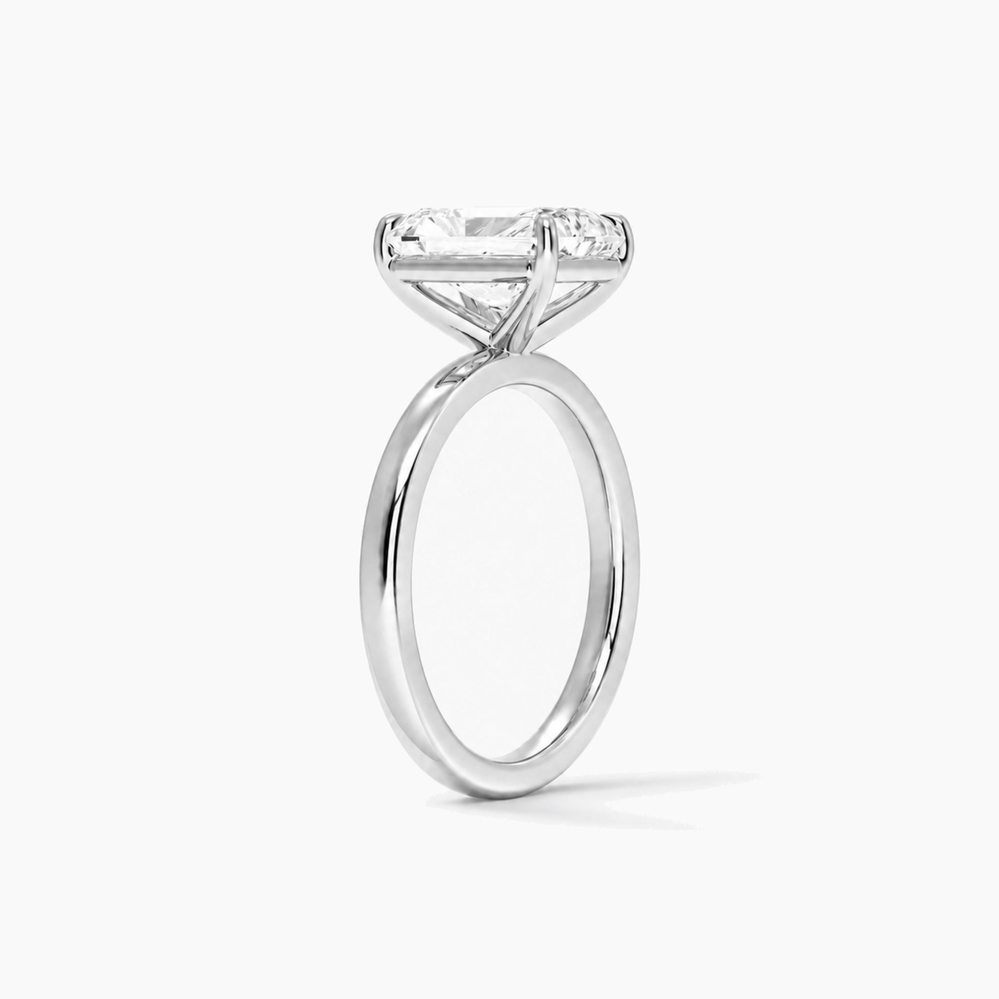 radiant-cut moissanite solitaire ring in white gold vermeil, side view