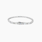 Round-cut and emerald-cut moissanite tennis bracelet in white gold vermeil, full product view.