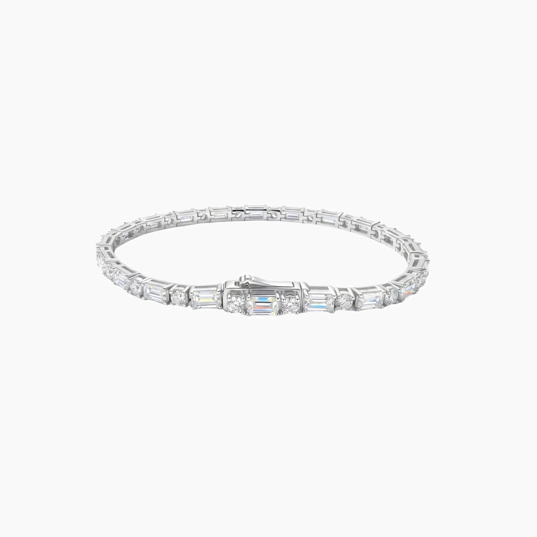 Round-cut and emerald-cut moissanite tennis bracelet in white gold vermeil, full product view.