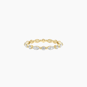 Round-cut and marquise-cut moissanite eternity ring in yellow gold vermeil, front view.