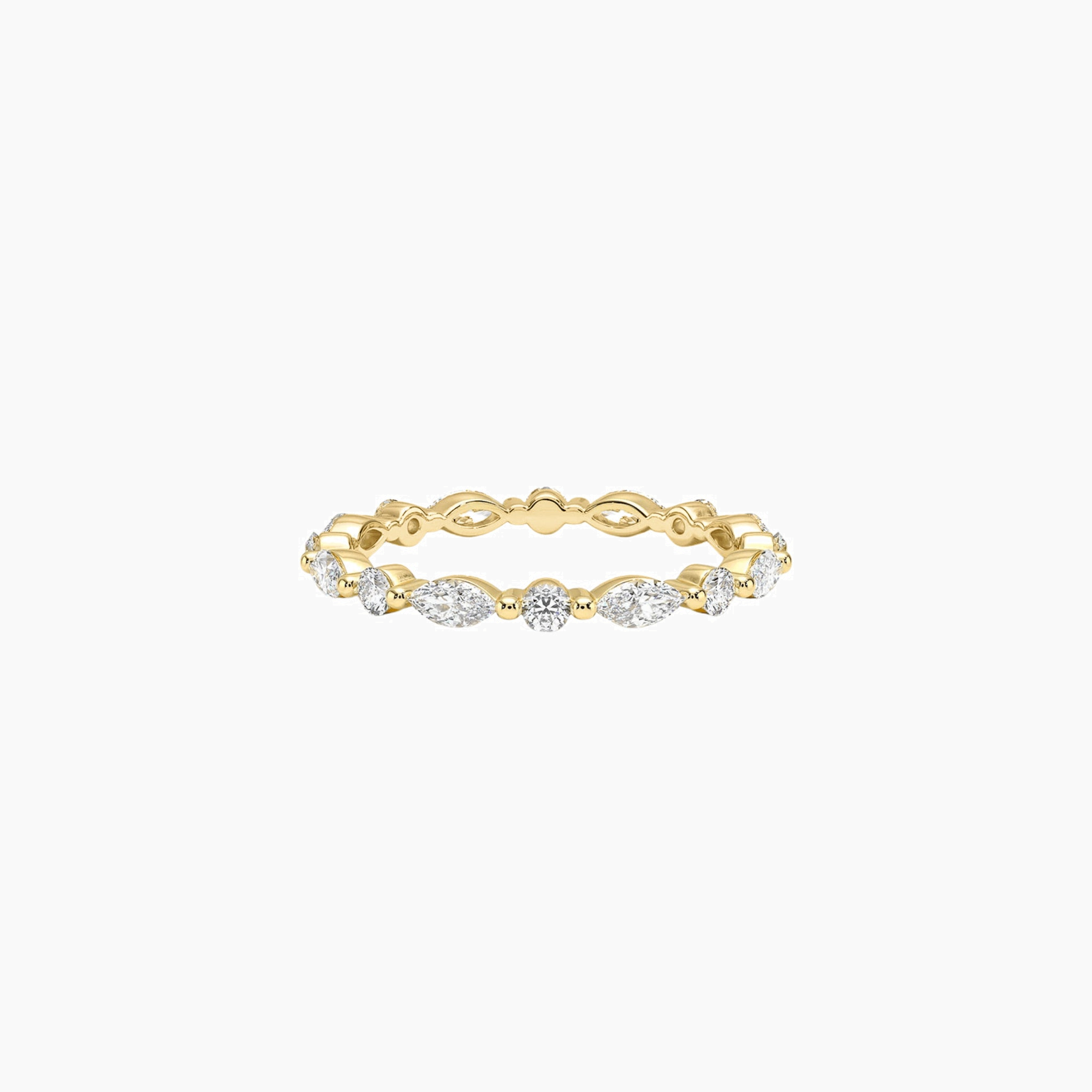 Round-cut and marquise-cut moissanite eternity ring in yellow gold vermeil, front view.