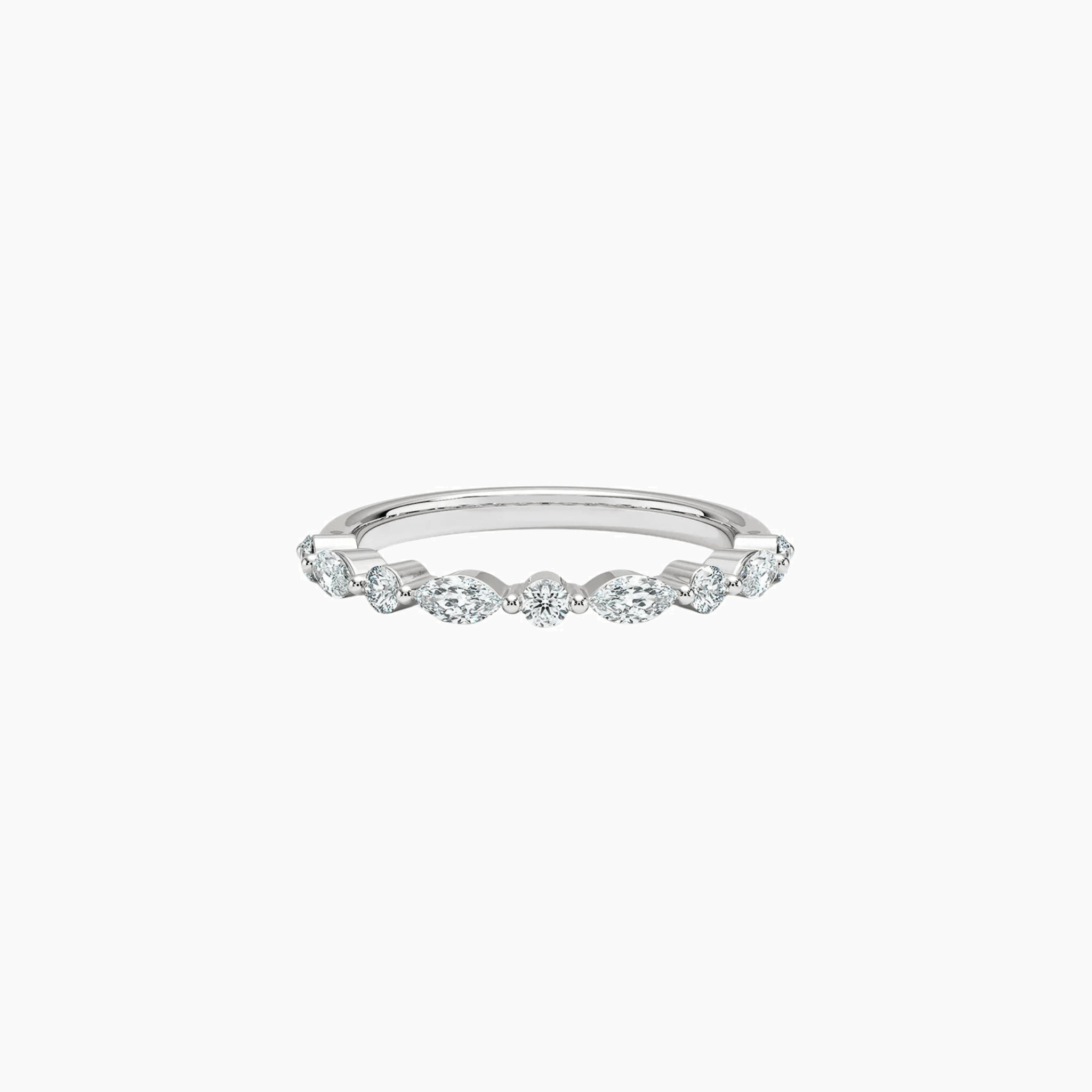 Round-cut and marquise-cut moissanite half eternity ring in white gold vermeil, front view.