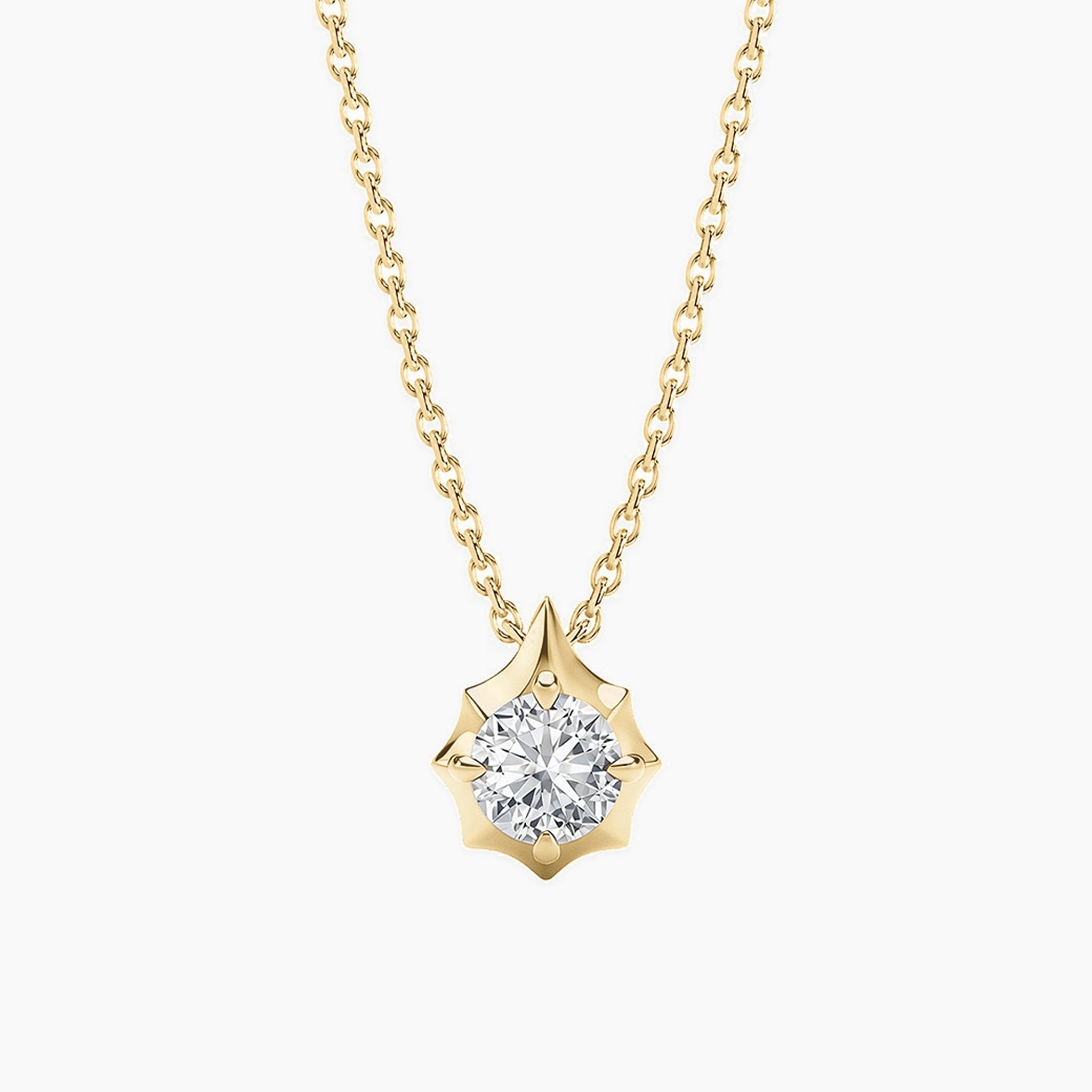 Round-cut moissanite pendant necklace in 18k yellow gold vermeil, front view.
